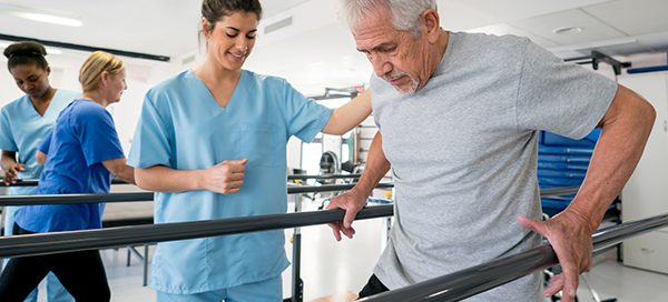 ManWithPhysicalTherapist