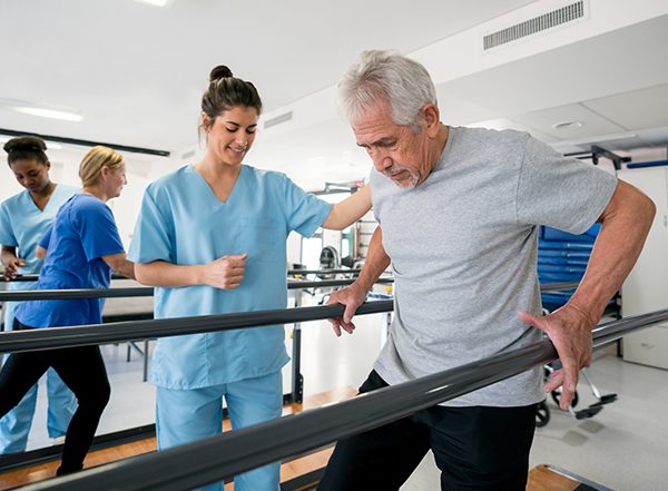 ManWithPhysicalTherapist
