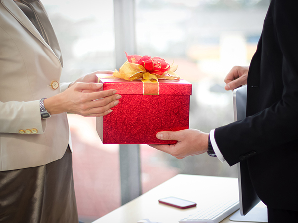 employee receiving a gift from employer