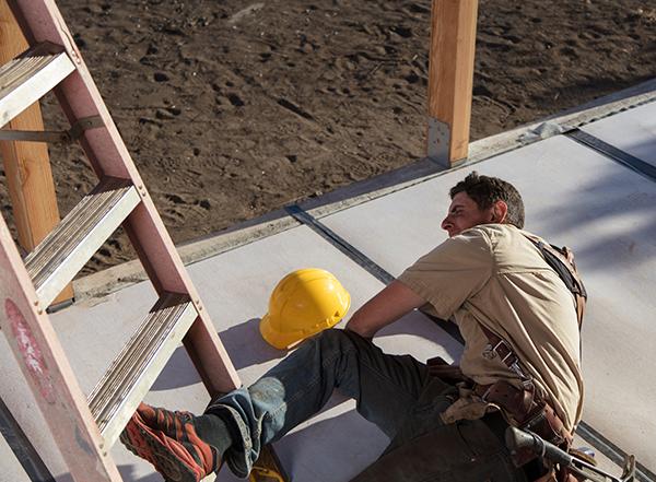 construction worker falling off ladder